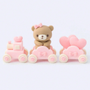 Teddy bear, train, gifts and rose gold balls