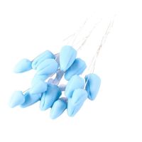 Buds bundle on a light blue wire