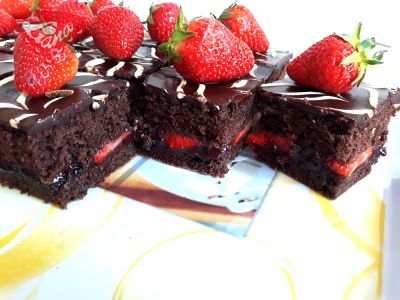 Gluten-free chocolate cubes with pieces of strawberries