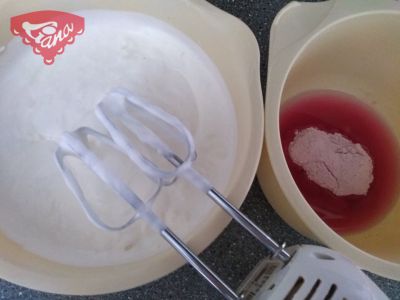 Gluten-free and dairy-free cupcakes with cherry and raspberry whipped cream