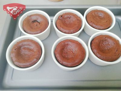 Gluten-free chocolate souffle with raspberry sauce