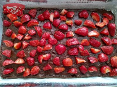 Gluten-free mega chocolate cake with strawberries