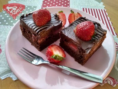 Gluten-free mega chocolate cake with strawberries