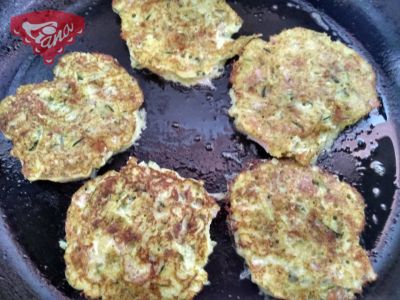 Gluten-free zucchini pancakes with bacon and smoked cheese