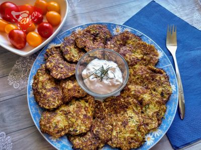Gluten-free zucchini pancakes with bacon and smoked cheese