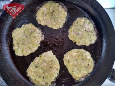 Gluten-free zucchini pancakes with bacon and smoked cheese