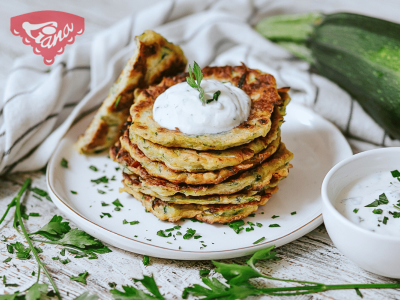 Gluten-free zucchini pancakes with yogurt-herb dip