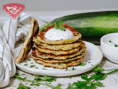 Gluten-free zucchini pancakes with yogurt-herb dip