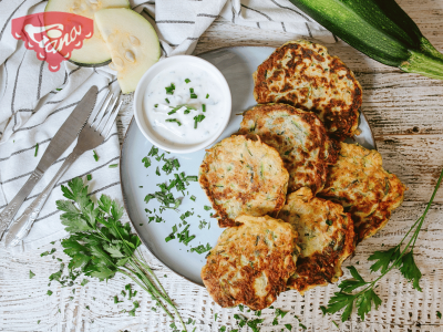 Gluten-free zucchini pancakes with yogurt-herb dip