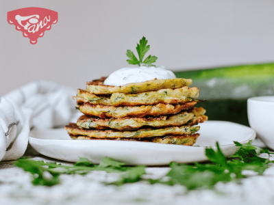 Gluten-free zucchini pancakes with yogurt-herb dip
