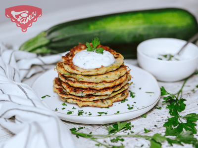 Gluten-free zucchini pancakes with yogurt-herb dip