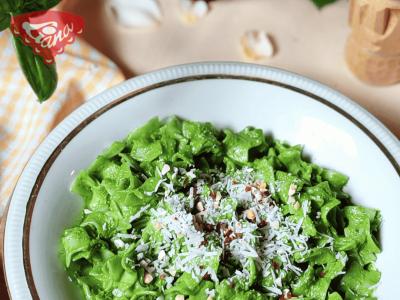 Gluten-free pancakes with roasted garlic and baby spinach sauce
