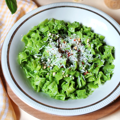 Gluten-free pancakes with roasted garlic and baby spinach sauce