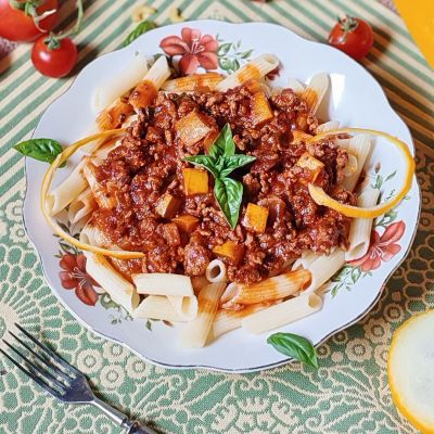 Gluten-free penne with zucchini and bolognese sauce