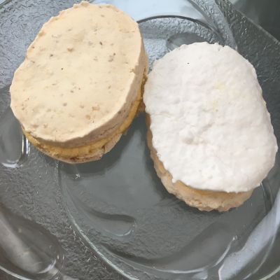 Gluten-free walnut and coconut sweets with yolk cream