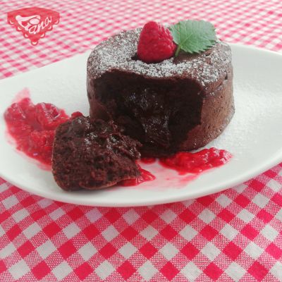 Gluten-free chocolate souffle with raspberry sauce
