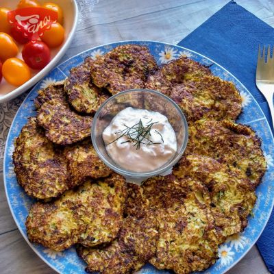 Gluten-free zucchini pancakes with bacon and smoked cheese