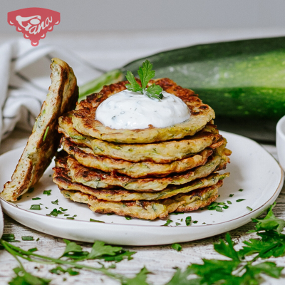 Gluten-free zucchini pancakes with yogurt-herb dip