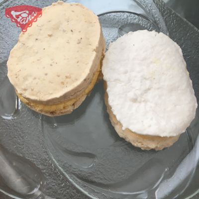 Gluten-free walnut and coconut sweets with yolk cream