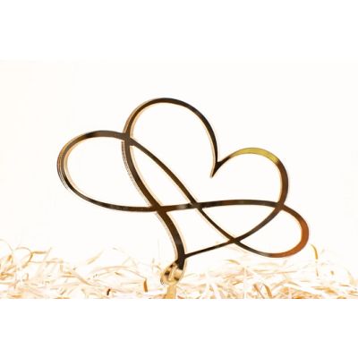 Geprägtes Herz und Unendlichkeitszeichen aus goldenem Acryl