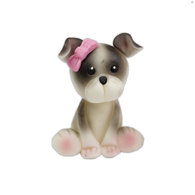 Hund mit rosa Schleife