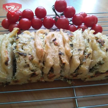 Gluten-free sourdough bread with cheese and spring onion