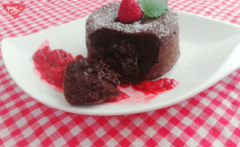 Gluten-free chocolate souffle with raspberry sauce