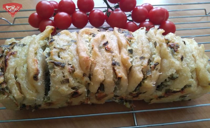 Gluten-free sourdough bread with cheese and spring onion