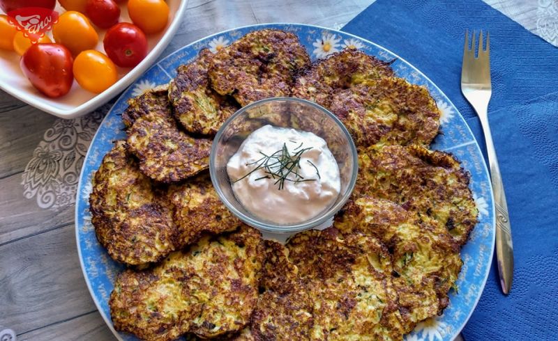Gluten-free zucchini pancakes with bacon and smoked cheese