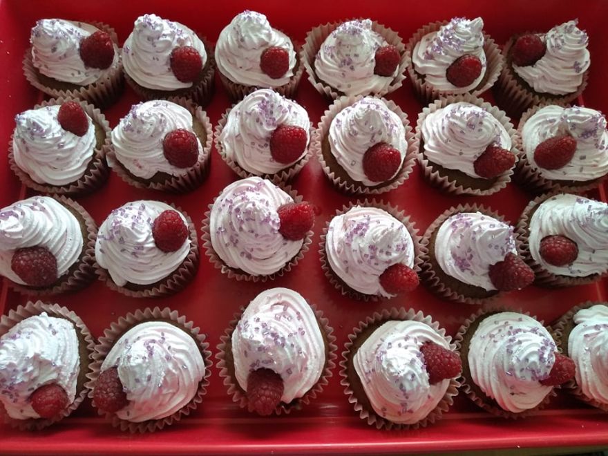 Gluten-free and dairy-free cupcakes with cherry and raspberry whipped cream