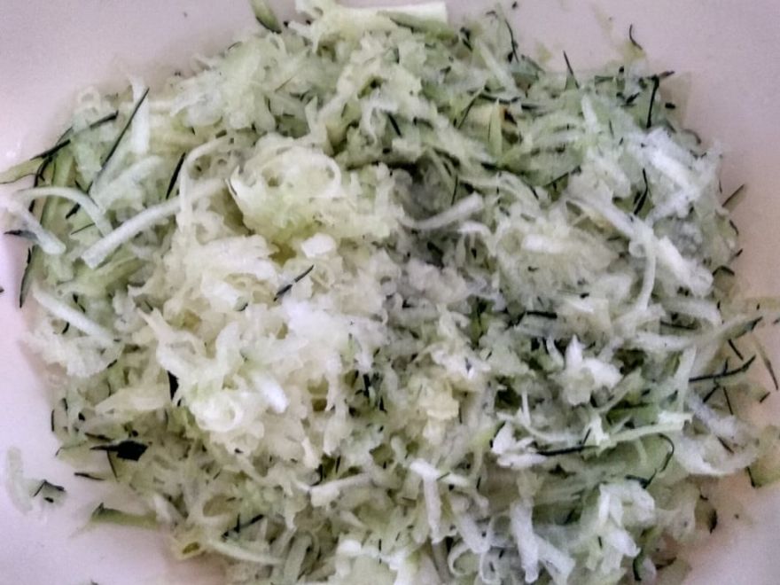 Gluten-free zucchini pancakes with bacon and smoked cheese