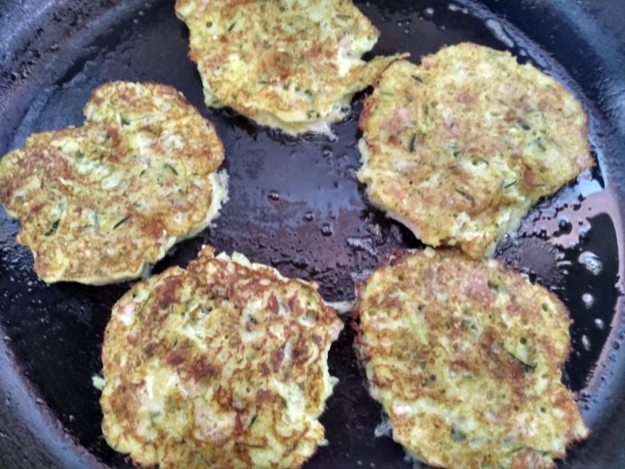 Gluten-free zucchini pancakes with bacon and smoked cheese