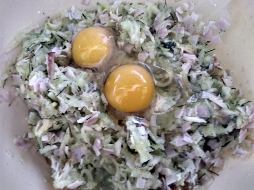 Gluten-free zucchini pancakes with bacon and smoked cheese